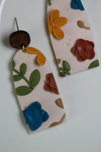 Floral  earrings on a white background