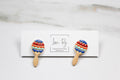 Colorful maraca-shaped earrings on a card with 'Love Ry Handcrafted Jewelry' branding.