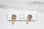 Colorful maraca-shaped earrings on a card with 'Love Ry Handcrafted Jewelry' branding.