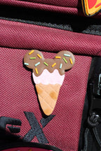 Ice cream cone pin on a red bag